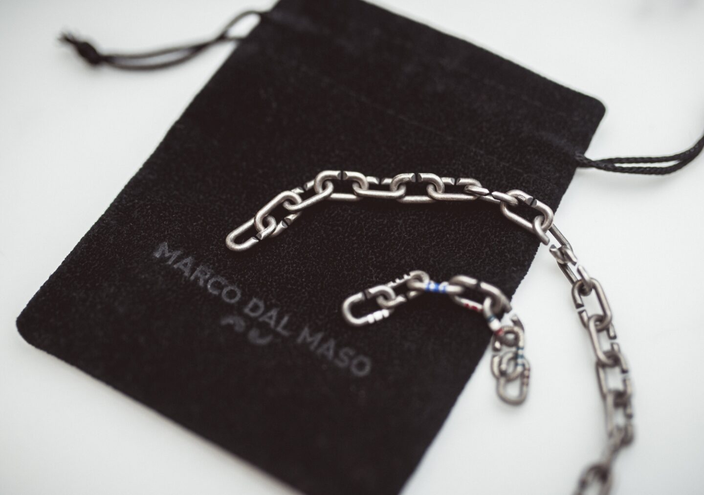 A picture if Marco Dal Maso chain link jewellery.