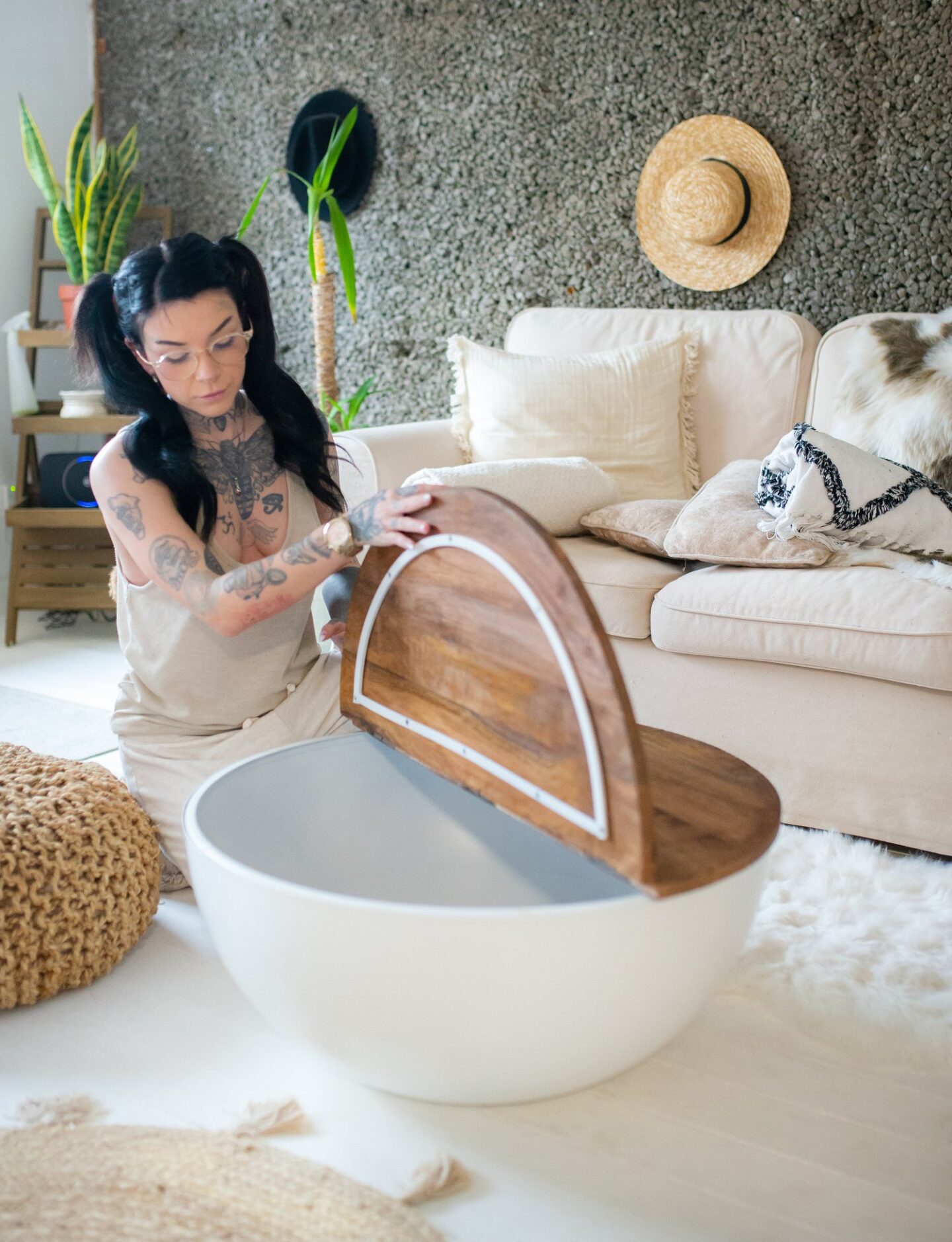 A picture of Eve Sara using the Creation Furniture Mango wood coffee table.