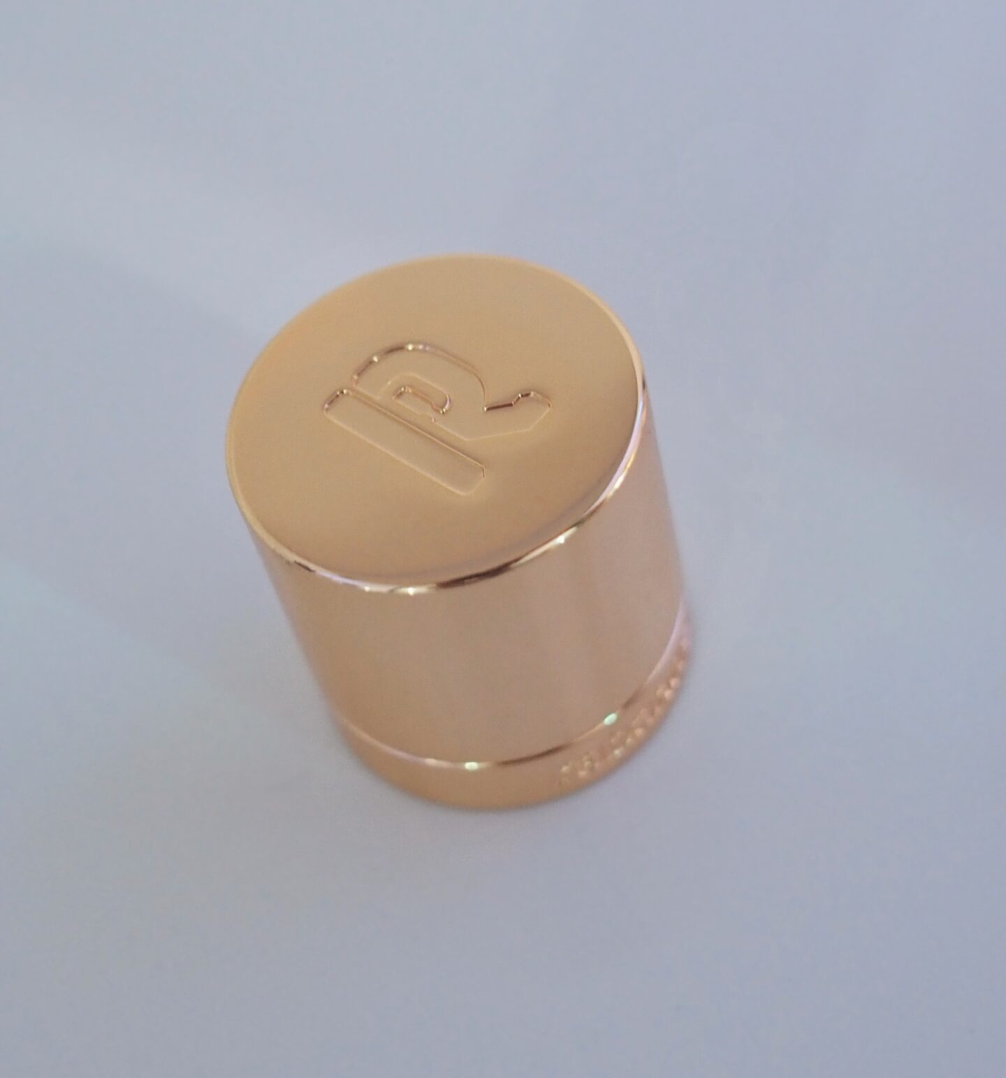 A picture of Million for her perfume lid/cap.