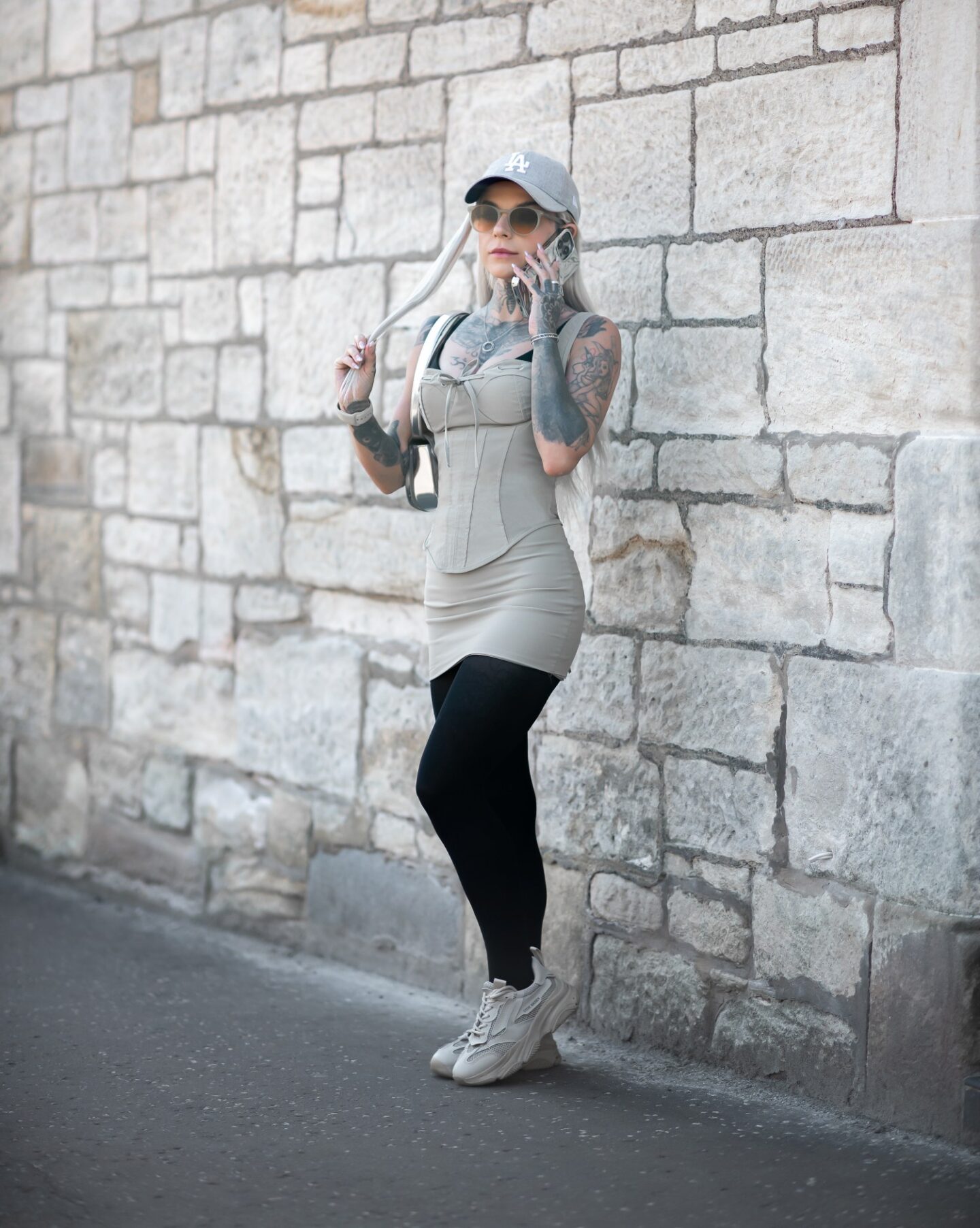 A picture of Eve Sara wearing a street style outfit.