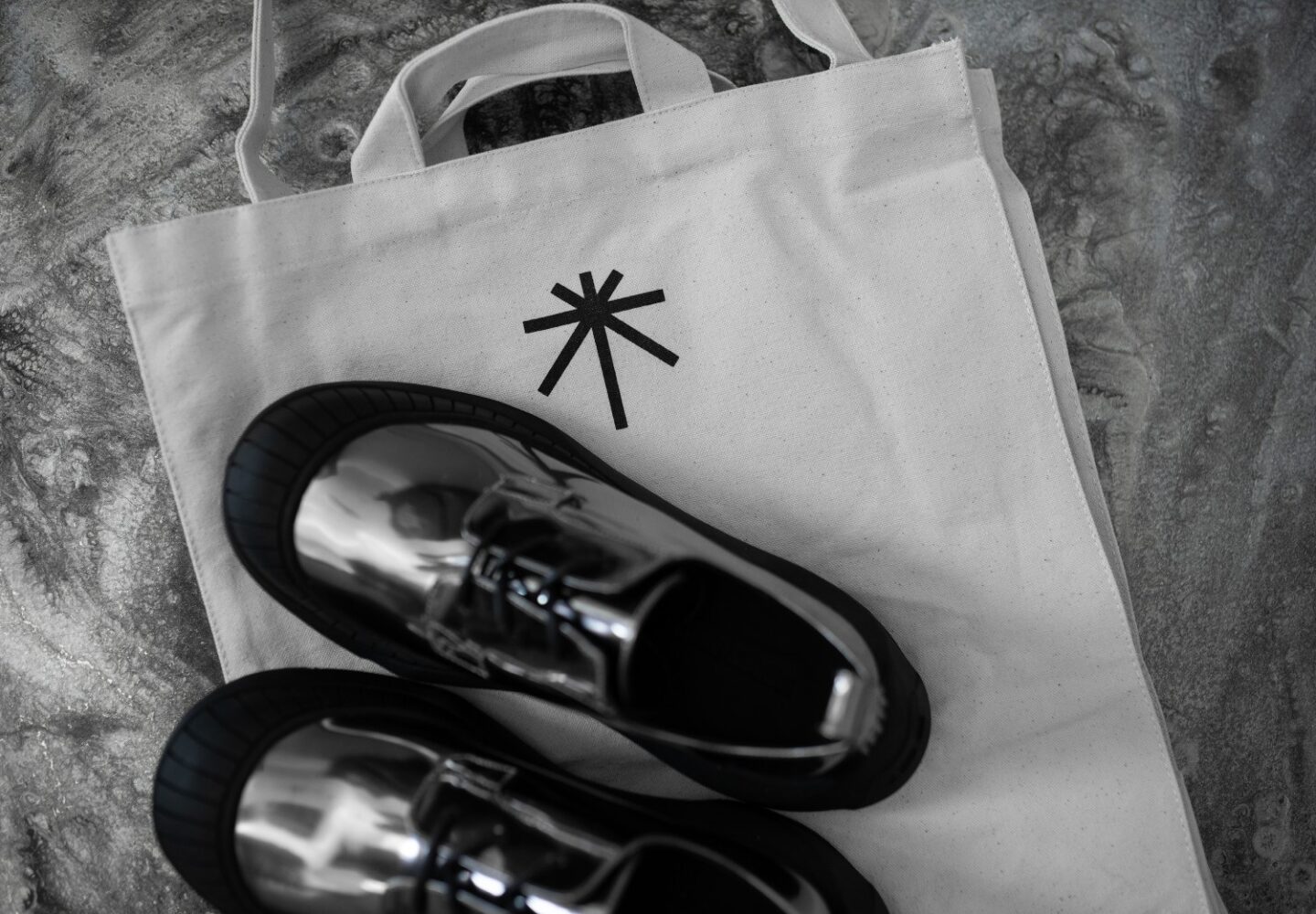 A picture of Hidden White Asher Gunmetal shoes with Hidden Whites Tote Bag.