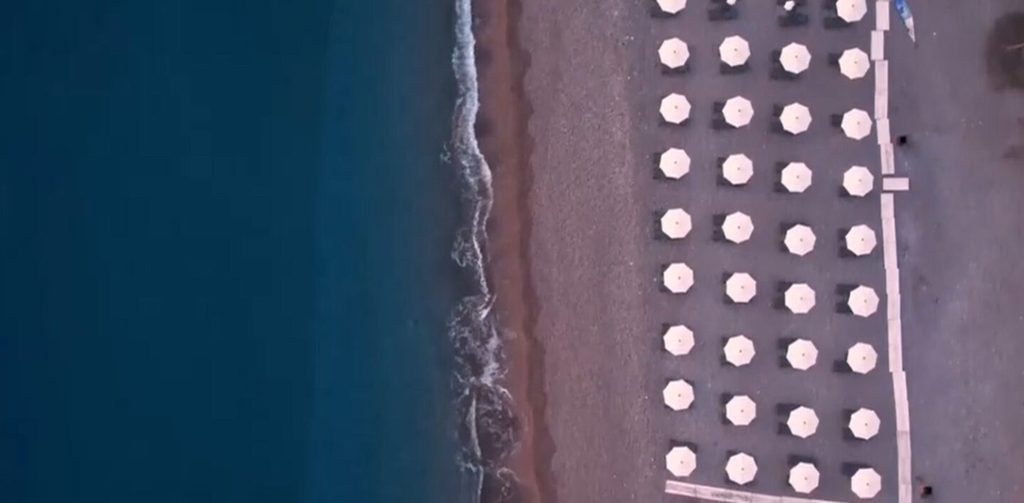 A top down picture of the stone beach at Lindos Grand Resort & Spa.
