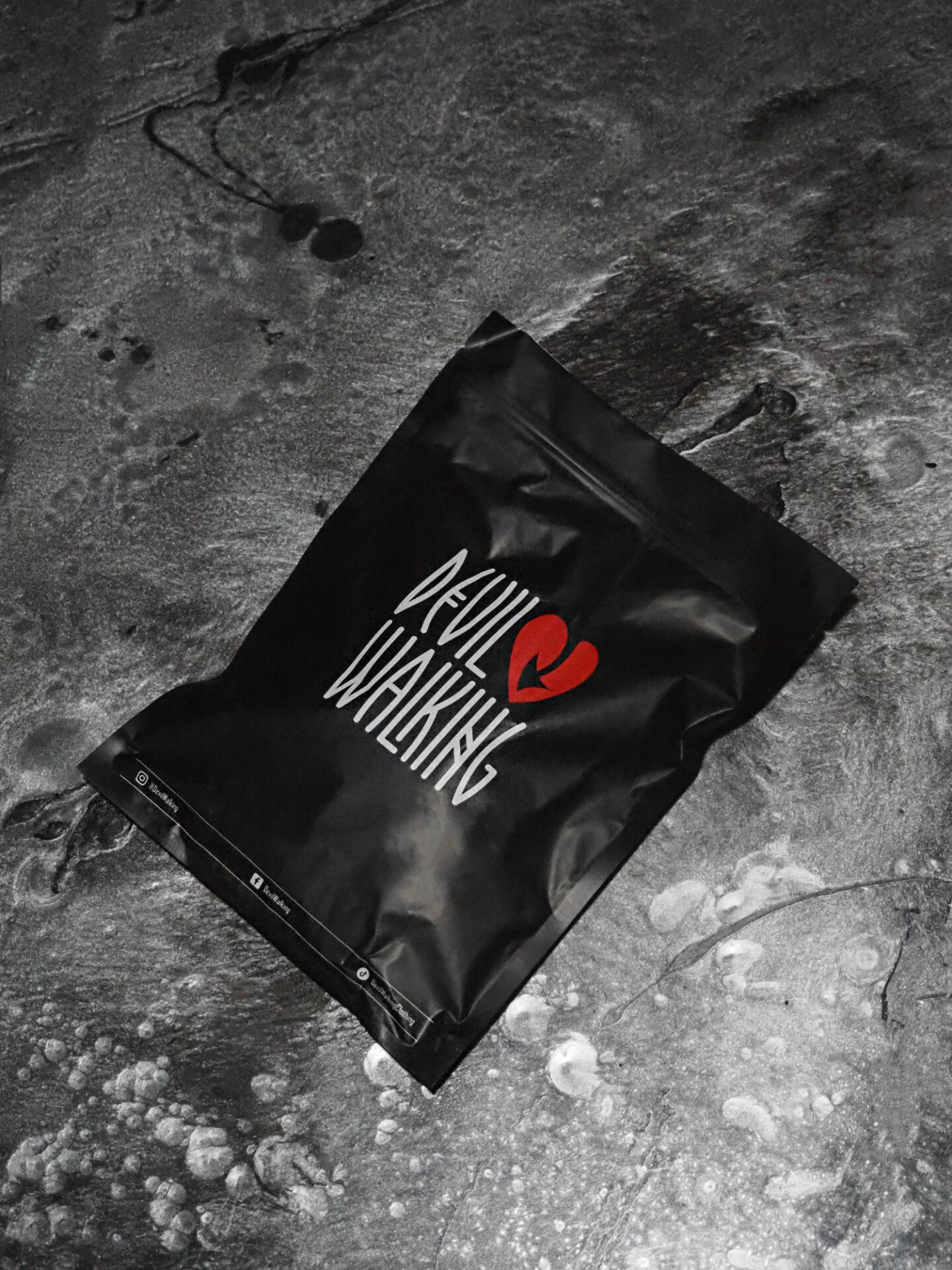 A picture of the packaging from Devil Walking Apparel. 