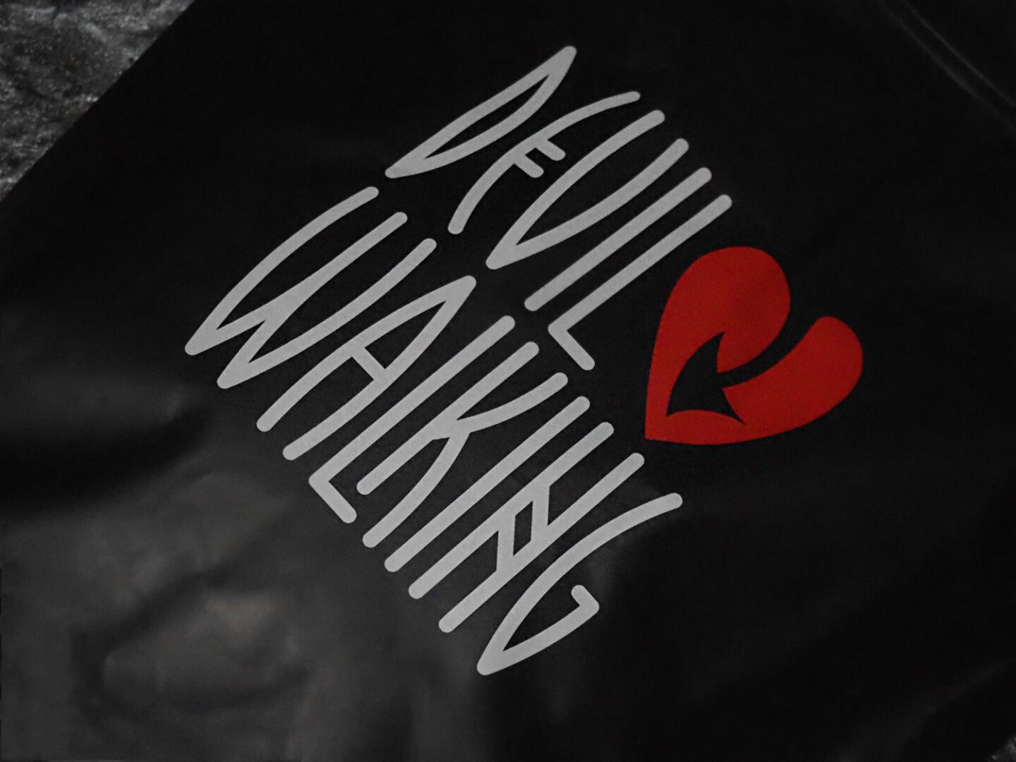 A picture of Devil Walking packaging and logo.