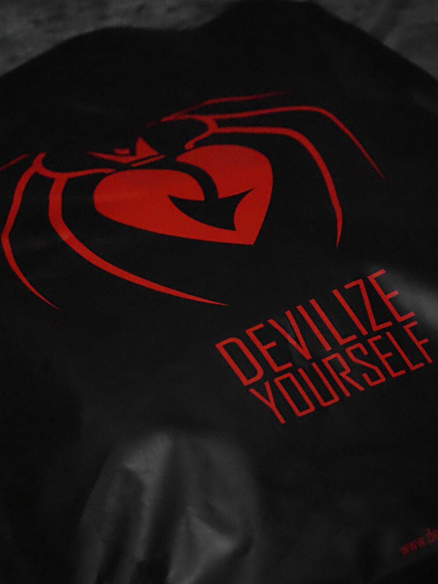 A close up shot of one of the sides to the Devil Walking packaging.