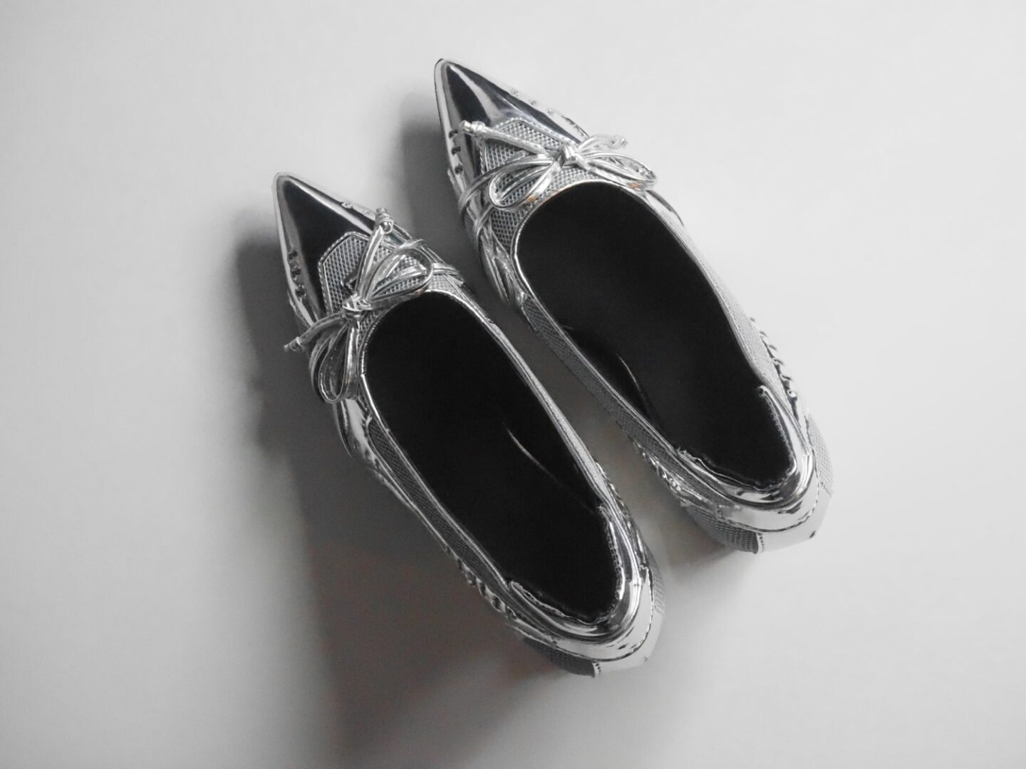 A picture of the Astra Arch Sneaker Heels from Asyllum.