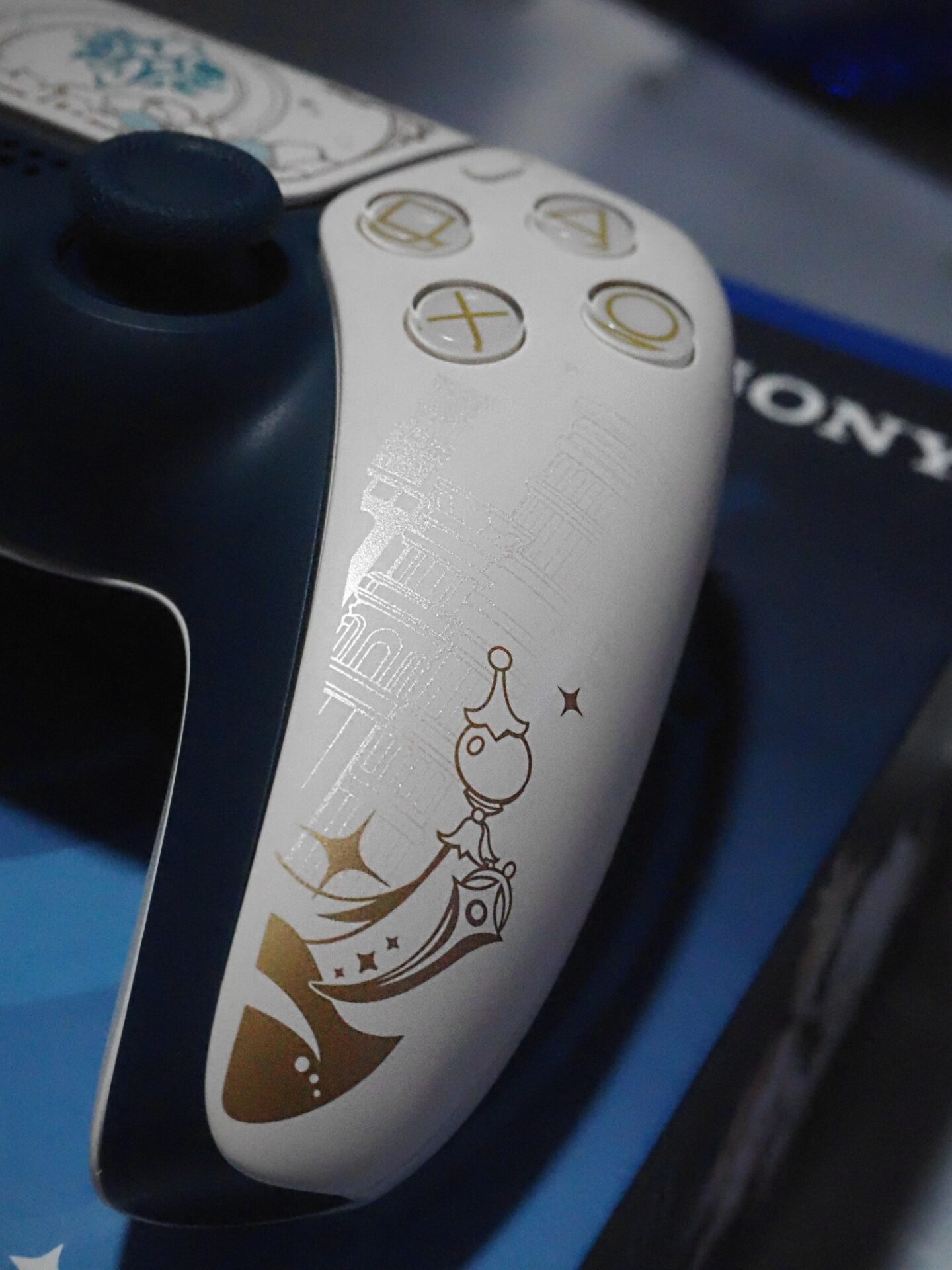 A close up of the details on the Genshin Impact Controller.