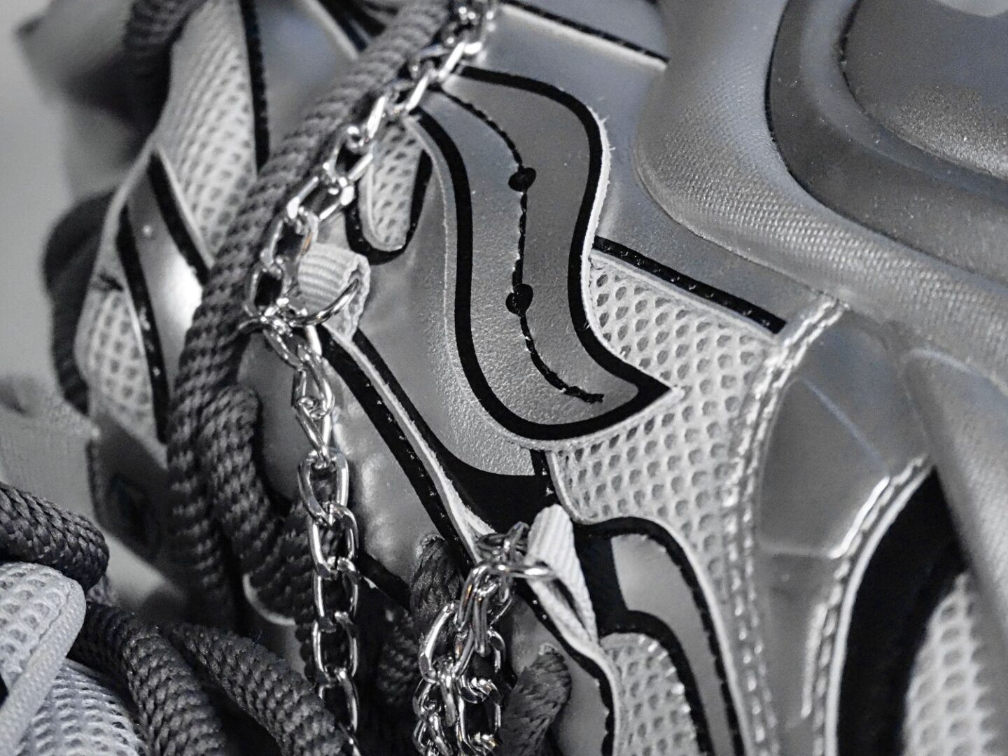 A close up of the detail from the Jupiter 10 - Silver sneakers.